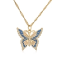 Macro view of 18K gold-plated butterfly pendant with blue enamel and sparkling zircons - Blue Beige Butterfly