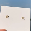 Golden crown earrings with sparkling rhinestones held against a clear blue sky - 925 Silver Needle / Gold Crown