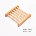 Bamboo soap dish in natural wood color measuring 8.8cm by 8.4cm with drainage bars - Natural Wood Style 01