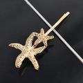 Starfish shaped hair clip in gold finish with realistic biological texture detail - Two Starfish Bobby Pins / Gold