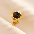 Macro shot of adjustable gold stainless steel ring with black marble stone inlay - Gold-Black Stone
