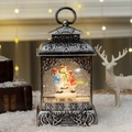 Vintage silver Christmas lantern with snowman snow globe and glowing warm light - Hollow Antique Silver Snowman Child
