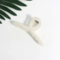 Close-up of pearl white hair claw clip with subtle glitter finish and metal spring - White