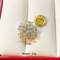 Macro view of a 1.7cm golden flower brooch with oval zircons and back clasp - Gold Flower C213