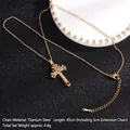 Golden titanium steel cross necklace featuring colorful cubic zirconia on a black stand - Cross No.5 Gold (A293)
