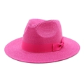 Detailed close-up of rose red woven straw sun hat with decorative satin bow ribbon - M (56-58cm) / Rose Red