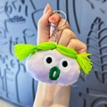 Süßer lavendelfarbener Plüsch-Schlüsselanhänger mit neongrünen Zöpfen und Stickerei - Geflochtenes Monster / Lila