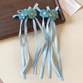 Pair of blue fabric flower hair clips with long ribbons on a rustic wooden tray - 32# Duckbill Clip / Single Piece / Blue