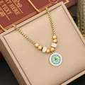Collana minimalista in acciaio con occhio di cristallo su una scatola porta gioie beige - 1# Collana / Oro