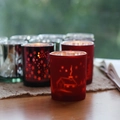 Silver and red glass elk candle holders with star and house patterns for Christmas decor - Red Christmas House