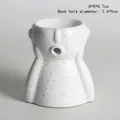 Abstract white ceramic oil burner with a funny face and vintage brown speckled finish - Bubble Blowing Character Burner