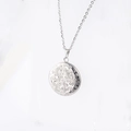 Detailed macro view of vintage engraved patterns on the round stainless steel locket pendant - Steel / Standard Size