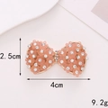 Detailed view of pink bow flower charm with zinc alloy base and dimensions 4cm x 2.5cm - Alloy / D617 Flower Bow