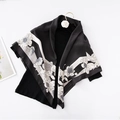 90cm silk square scarf with black and white floral prints and stripe border on white backdrop - Flora-Black