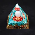 Orgonite pyramid featuring turquoise stones, white sphere, and lotus mandala element - QK17 Turquoise / 6cm