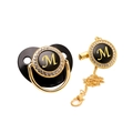 Luxurious black baby pacifier with gold rhinestones and capital letter M detail - Letter M