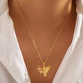 Elegant 18K gold plated necklace with angel cupid pendant and shimmering cubic zirconia - Cupid (XHN006GL)