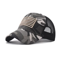 Close-up of camouflage canvas texture and khaki American flag patch on a mesh trucker hat - Adjustable / US Flag Camouflage