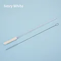 Reusable ivory white Tritan telescopic straw set with cleaning brush on blue background - Ivory