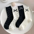 Détail de chaussettes en tricot avec pois, bordure en dentelle et nœuds décoratifs fins - Taille unique / Couleurs Mixte