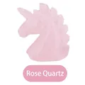 Hand-carved rose quartz unicorn figurine with natural pale pink crystal texture - Rose Quartz Unicorn