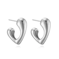 Detailed close-up of polished silver heart earrings with a multi-layered hollow design - Irregular Heart Studs / White Gold