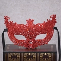 Macro detail of red sequin glitter lace party mask with black ribbon ties on vintage book - One Size (21x12x4cm) / Red