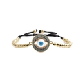 Verstellbares gewebtes Evil Eye Armband mit Goldperlen und blauen Zirkonia Kristallen für Damen - Schwarzes Seil mit Kupferperlen