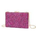 Pochette de soirée fuchsia avec texture coquillage et bandoulière chaîne dorée - Rose rouge