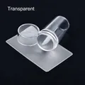 Close-up of clear nail art stamper set with scraper tool on black background - Single Head Stamper Style / Clear