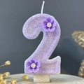 Glittery light purple number 2 birthday candle with 3D flower detail on wood base - Number 2