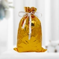 Golden reflective Christmas gift bag with star patterns and white ribbon closure - Laser Gold 2 (29*43cm)