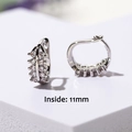 Detail view of silver C-shaped earrings with micro-paved zircons and 11mm inner diameter - E524-Double Row Pavé / Silver