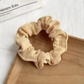 Floral bubble textured scrunchie in light beige on a wooden tray with a minimalist aesthetic - 11# Light Beige Seersucker