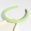 Detail shot of light green sponge padded headband on a minimalist tray for styling - Light Green
