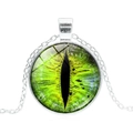 Detailed close-up of a green cat-eye glass dome pendant on a silver metal chain - Silver Base - Green Eye