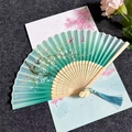 Blue-green gradient folding fan with floral butterfly patterns and matching silk tassel - Butterfly & Cherry Blossom - Light Green