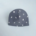 Dark grey cotton knit baby beanie featuring white geometric patterns on blue background - Geometric Graphic