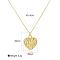Detail view of a 18k gold plated hollow heart pendant with 45+5cm chain dimensions - Shell Texture Pendant Necklace / Gold