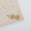 Macro shot of gold sunburst evil eye stud earrings with zircon inlay on stone - ES2739 Round Gold Evil Eye