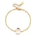 Detail of Christmas Santa charm on golden stainless steel beaded bracelet with lobster clasp - Santa Claus / Yellow