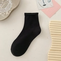 Classic black cotton crew socks with stylish rolled edges for a minimalist summer look - One Size / Black