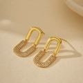 Pendientes dorados en forma de U con circonitas blancas de diseño minimalista - Plata 925 / Oro de 18 quilates (con tapón de plata)