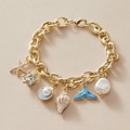 Bracciale a catena dorata con ciondoli marini come stella marina, tartaruga e perle - Bracciale con Ciondolo Oceano Oro