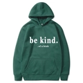Dark green oversized hoodie with white 'be kind' slogan print in a flat lay view - S / Dark Green