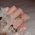 Elegant gold ring featuring small ruby and white gemstone heart accents on hand - Gold Heart Red White Gem Ring (J4849)