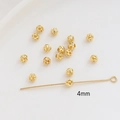 Macro detail of 4mm gold hollow spacer bead on T-pin for DIY jewelry making - 4mm / 18K Gold