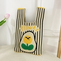 Knitted handbag with black and white vertical stripes and yellow flower pattern detail - Flower-Yellow