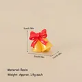 Miniature golden Christmas bells with a red bow, resin DIY craft accessory 2x2x1cm - No.70 - Resin Mini Bell with Red Bow