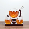 Detailed globe whiskey decanter with etched map, internal glass ship, and two glasses - Square Wood Stand, Bottle And Cups